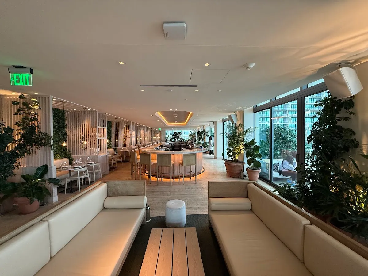 Azure at EDITION's rooftop terrace in the evening, overlooking City and bay views, rooftop in Downtown, Tampa.