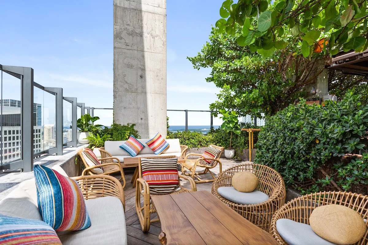 Sugar Rooftop's rooftop terrace in the evening, overlooking 360° Miami/Brickell skyline views in Brickell, Miami.